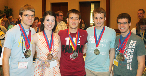 NATIONAL Medalists – Philip Hanigan (left), Abigail Miller, Stephen Kotopka, Matthew Sievert and Nathan Kramer medaled as the academic decathlon team of Pius X High School in Lincoln placed fifth in the nation in the National Academic Decathlon Competition held in Honolulu, April 24-26. (Courtesy photo)